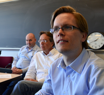 Adam Jørring with Prof. Tim Bollerslev and Prof. Claus Pörtner during a presentation at the 2013 DAEiNA Meeting.